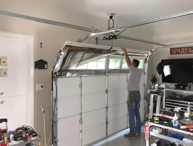 Garage door section replacement by Fort Collins Garage Door Repair in Fort Collins