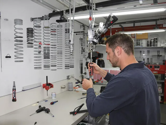 Fort Collins Garage Door Repair safety certified technician performing precision spring replacement in Fort Collins