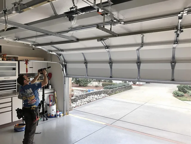 Garage door track repair service by Fort Collins Garage Door Repair in Fort Collins